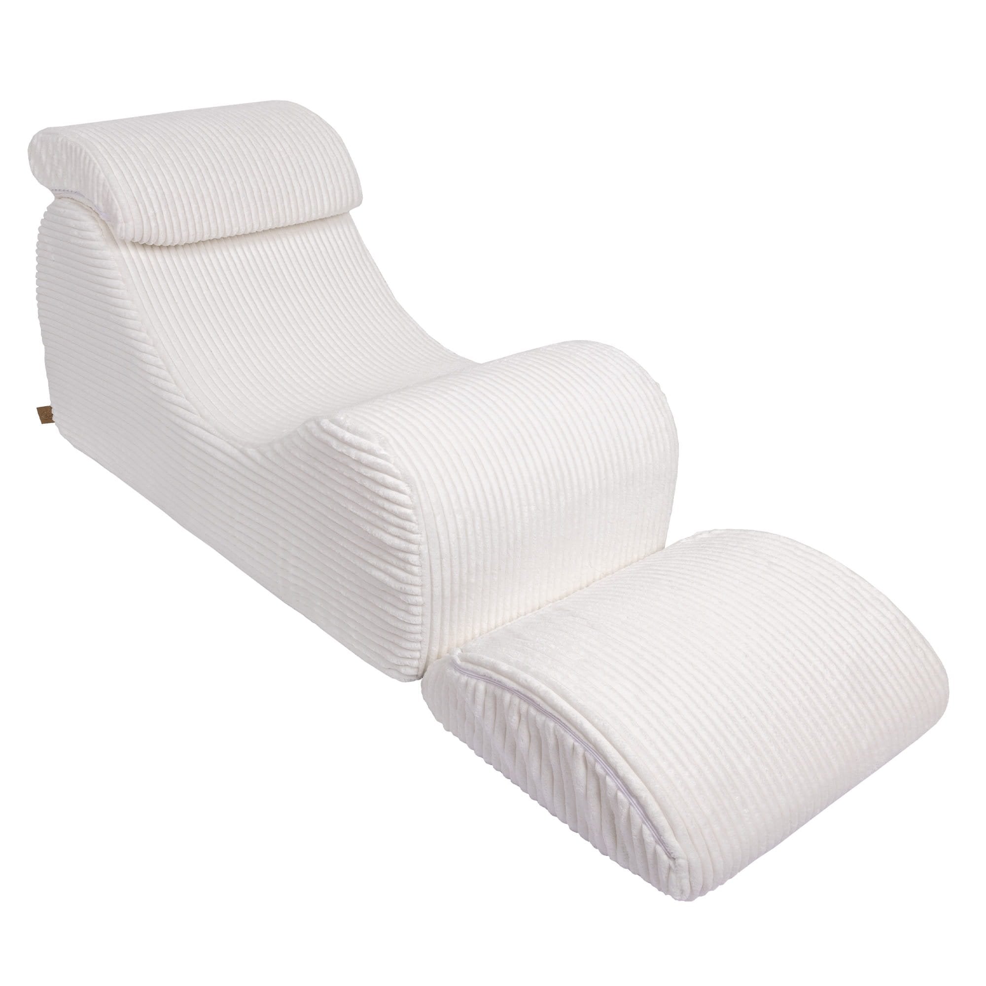 5. White furrycord Wave Lounger with extended footrest, emphasizing comfort and design