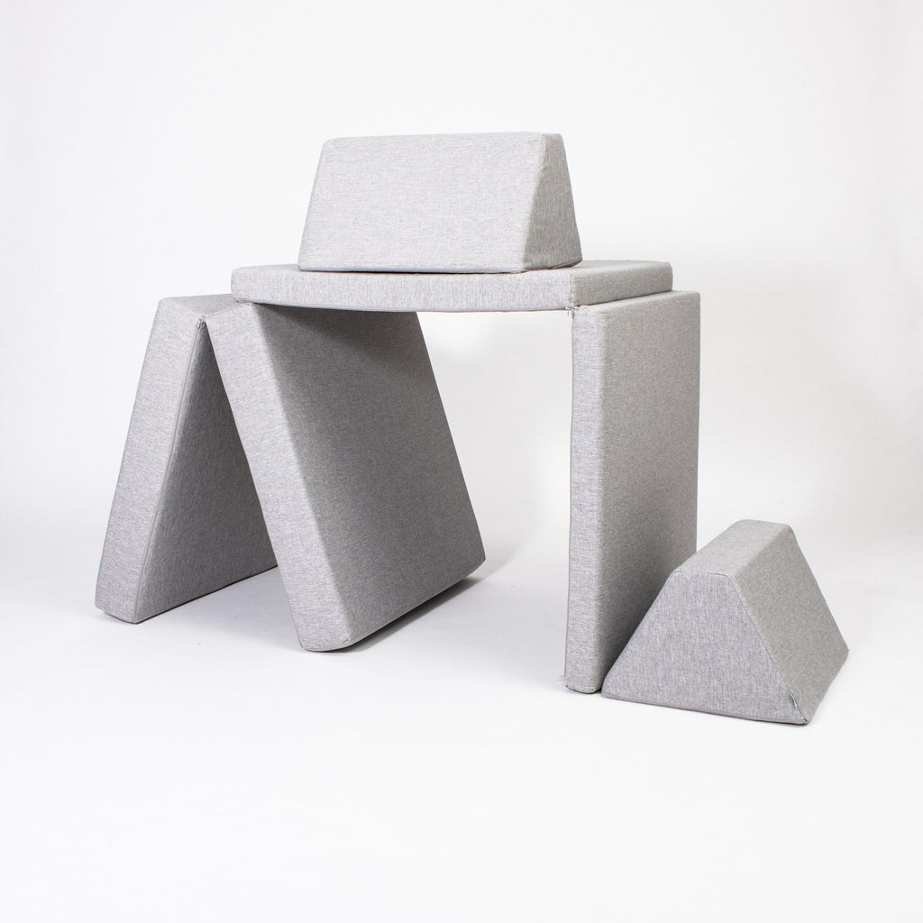 2. Grey Monboxy activity play mattress set arranged in creative structure on white background