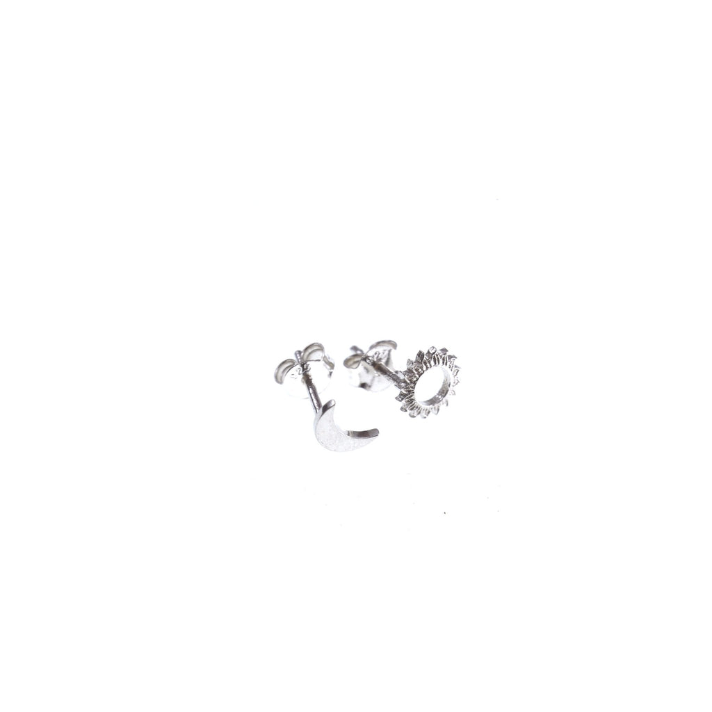 2. Silver Moon and Sun stud earrings by New Vintage by Kriss, displayed in studio setting