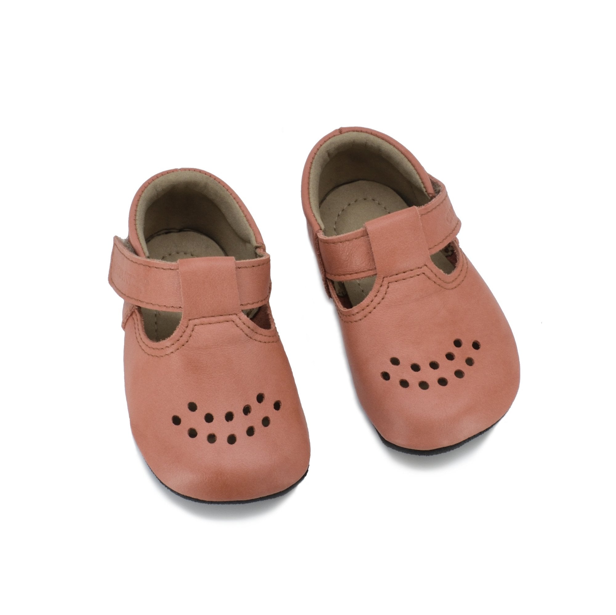 5. Studio image of pair of Omaking Mutsu coral slippers with perforated toe design