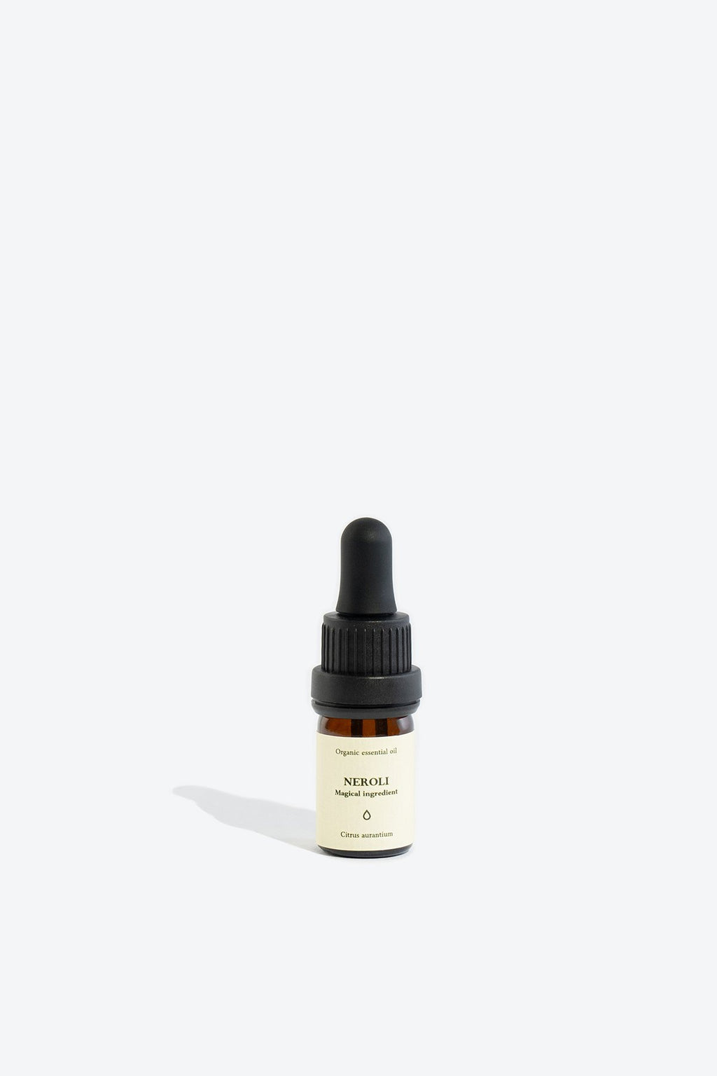3. Smells Like Spells NEROLI Essential Oil bottle with cherry accent, highlighting natural ingredients