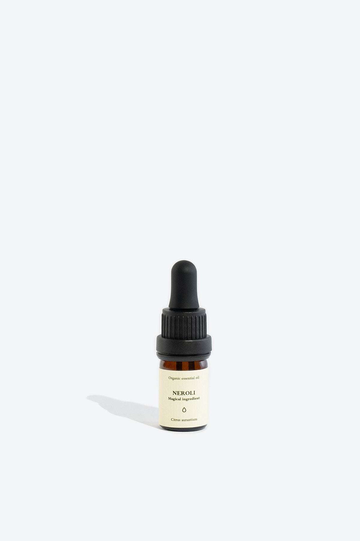 3. Smells Like Spells NEROLI Essential Oil bottle with cherry accent, highlighting natural ingredients