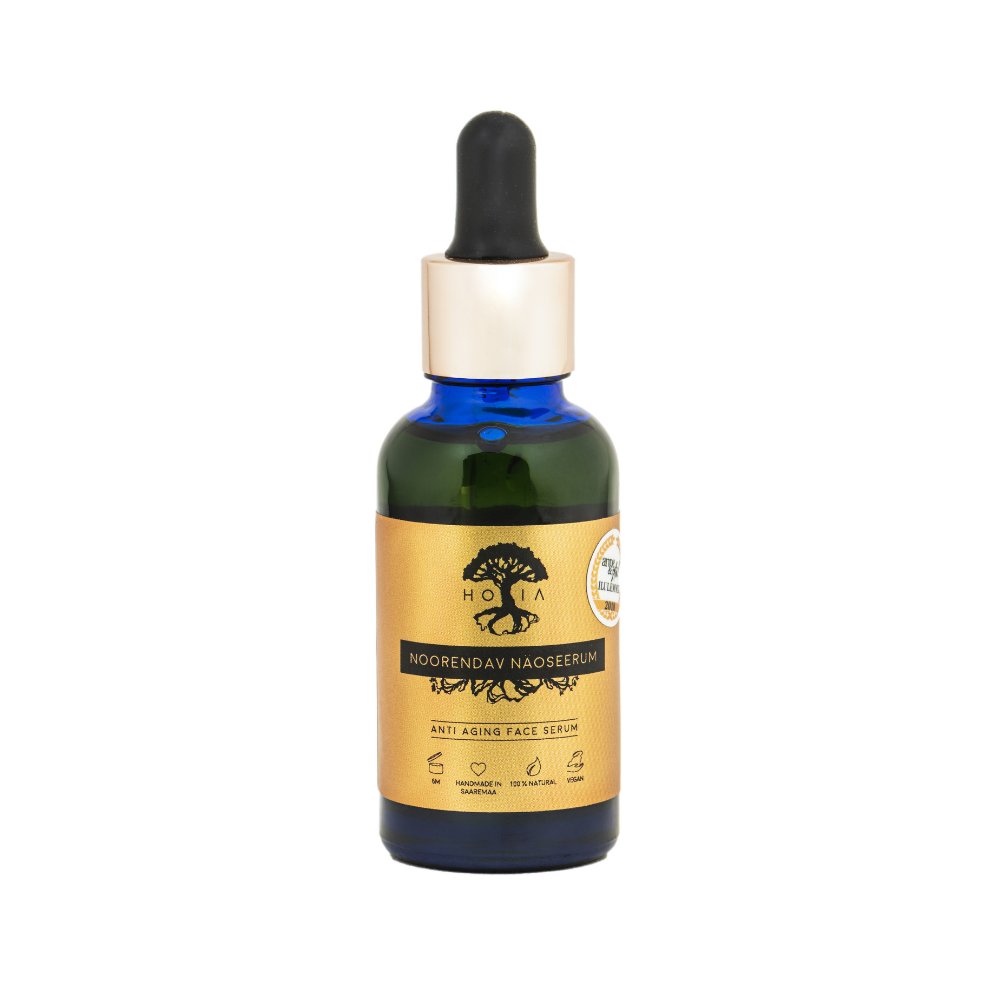 3. HOIA homespa Anti-Aging Face Serum in blue glass bottle with gold label, close-up in bright studio setting
