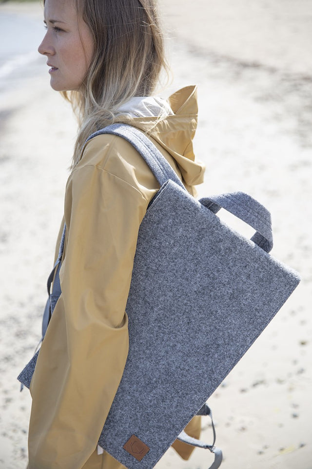 3. Close-up of Nordhale Backpack Lund in grey showing adjustable webbing straps and handle