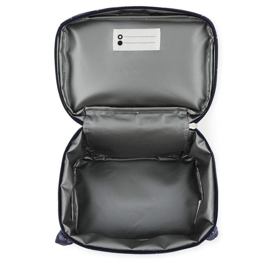 2. Interior view of Trixie Baby Mr. Penguin lunch bag with isothermal lining and name tag