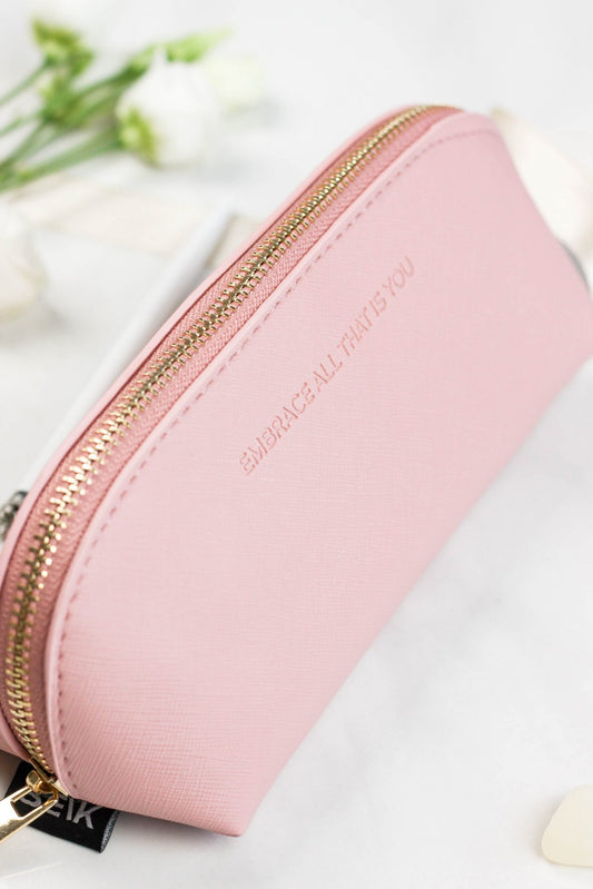 2. Close-up of SEIK pink pencil case showing gold zipper and motivational text