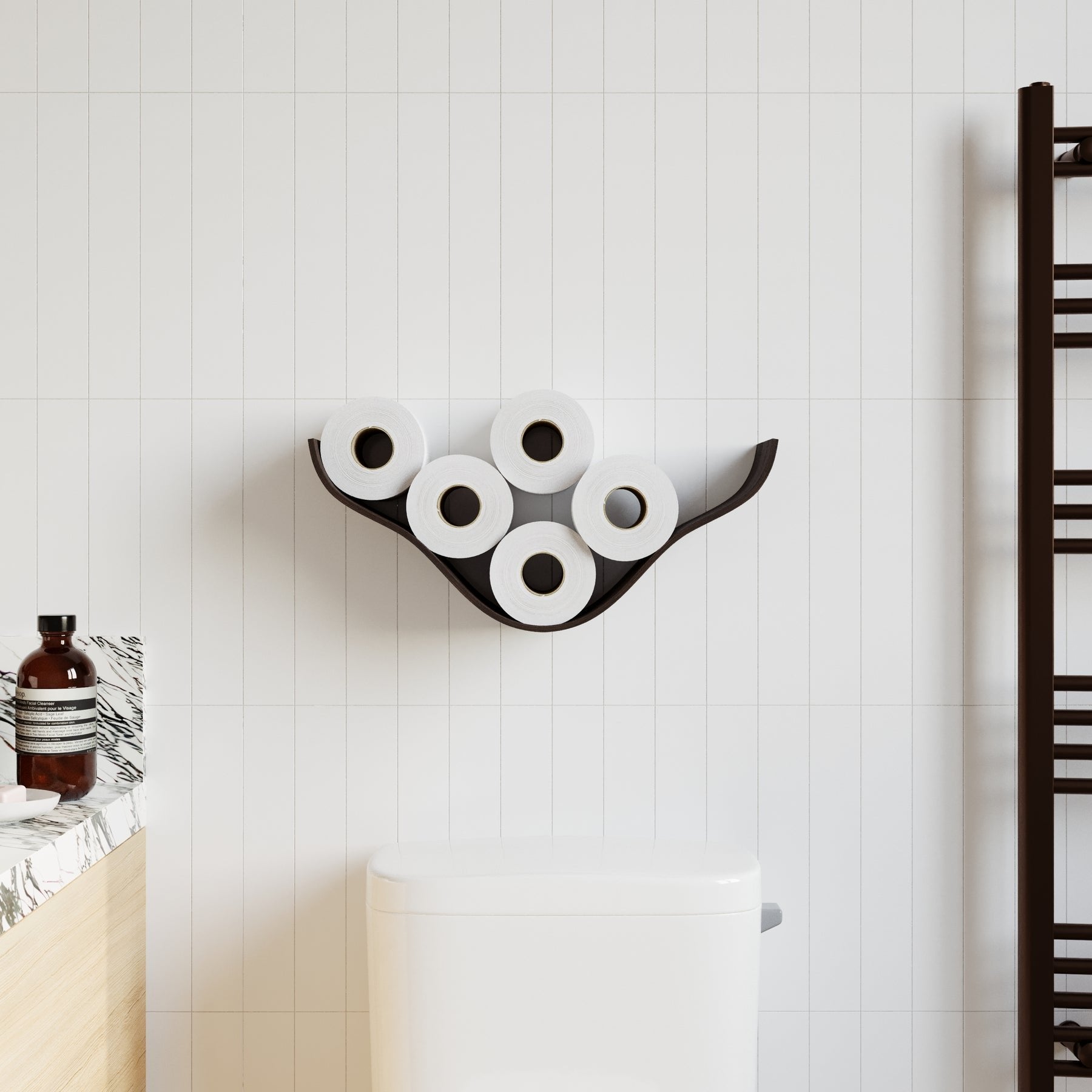 1. Wall-mounted smoked oak wooden toilet paper holder in modern bathroom setting with white tiles and towel rack