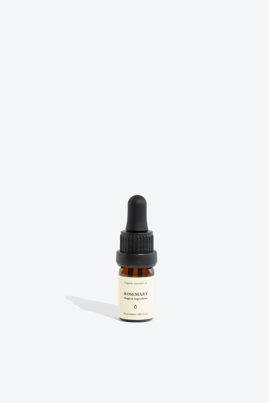 2. Smells Like Spells ROSEMARY Essential Oil in 5 ml glass bottle with pipette, studio setting
