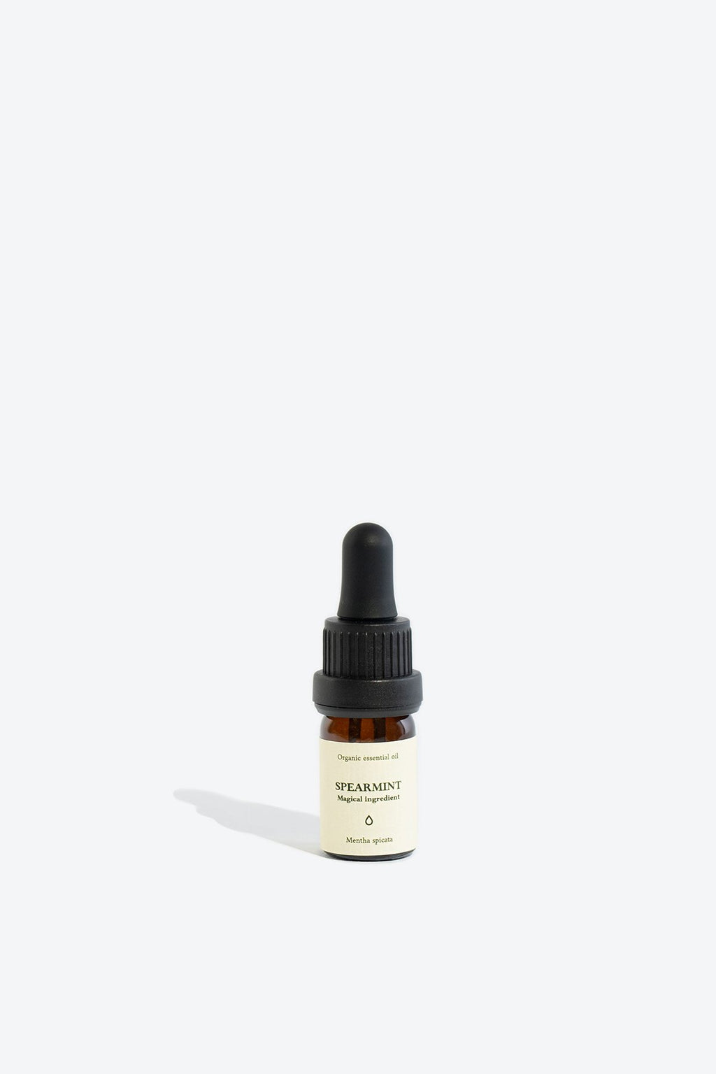3. Close-up of Spearmint essential oil 5 ml glass bottle with pipette, highlighting eco-friendly packaging