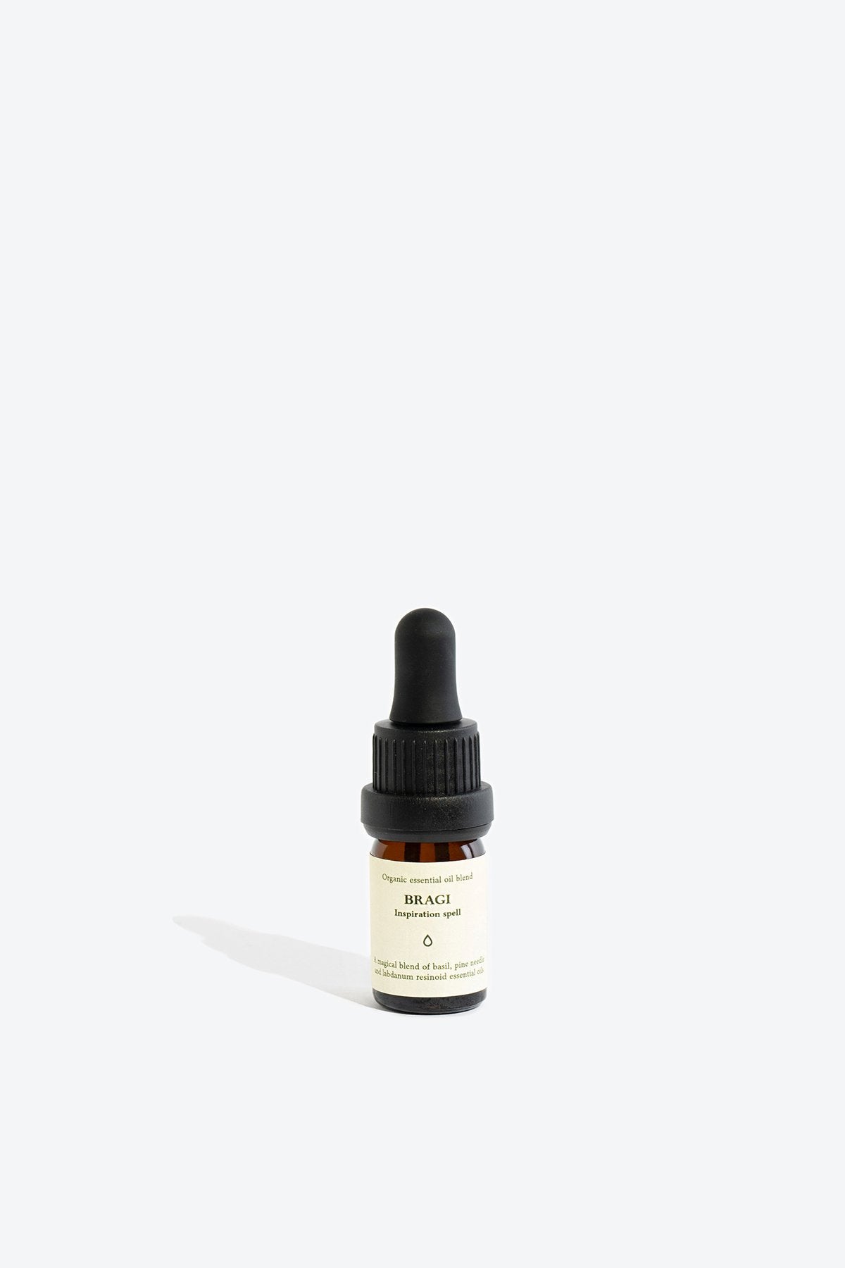 1. Smells Like Spells Essential Oil Blend BRAGI in 5 ml glass bottle with pipette, studio shot