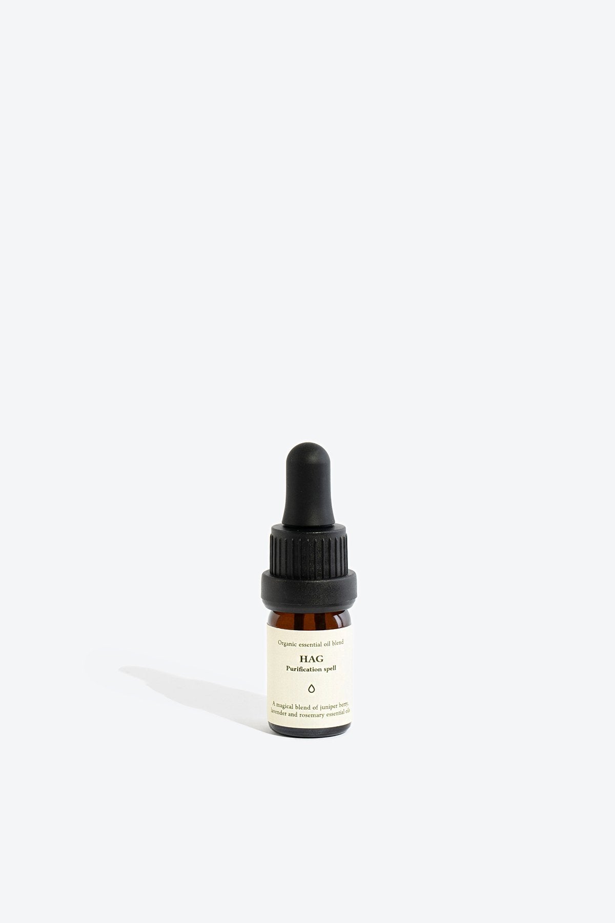 3. Smells Like Spells Essential Oil Blend HAG in 5 ml glass bottle, studio setting