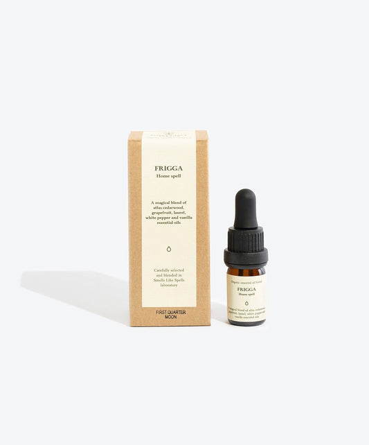 1. Smells Like Spells Essential Oil Blend FRIGGA with packaging, featuring 5 ml glass bottle and box, designed for harmony and protection