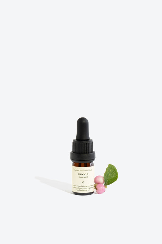2. Smells Like Spells Essential Oil Blend FRIGGA in 5 ml glass bottle with pipette, shown with decorative elements