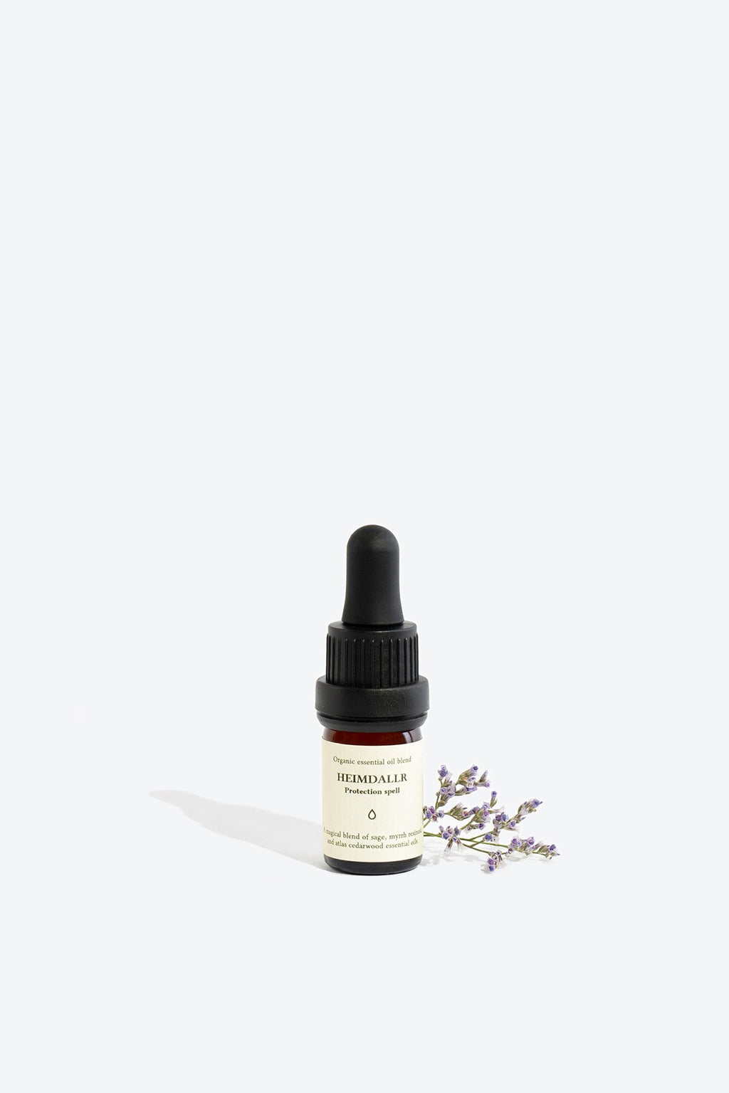 1. Smells Like Spells HEIMDALLR essential oil blend in 5 ml glass bottle with pipette, shown with lavender sprig
