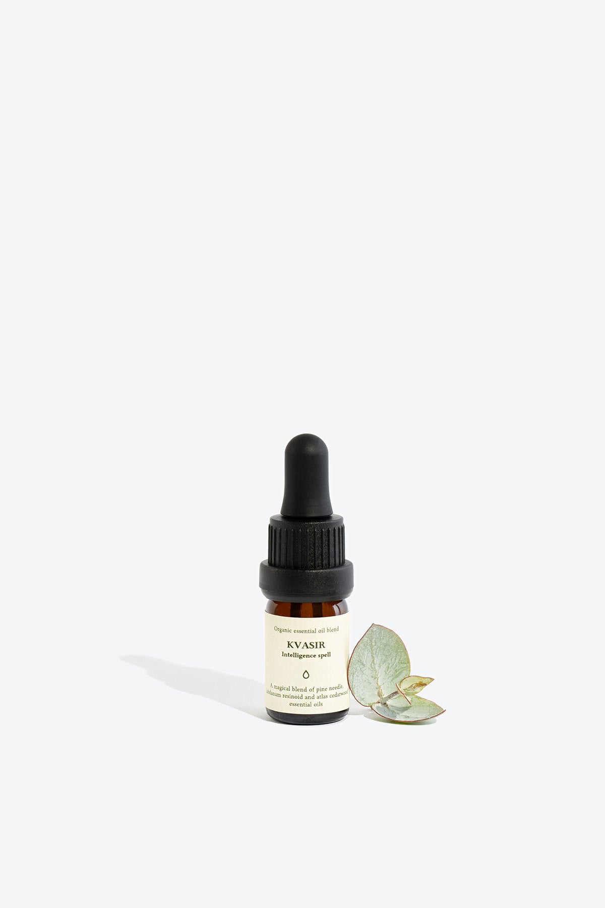 3. Smells Like Spells Essential Oil Blend Kvasir with eucalyptus leaf, 5 ml glass bottle in studio setting