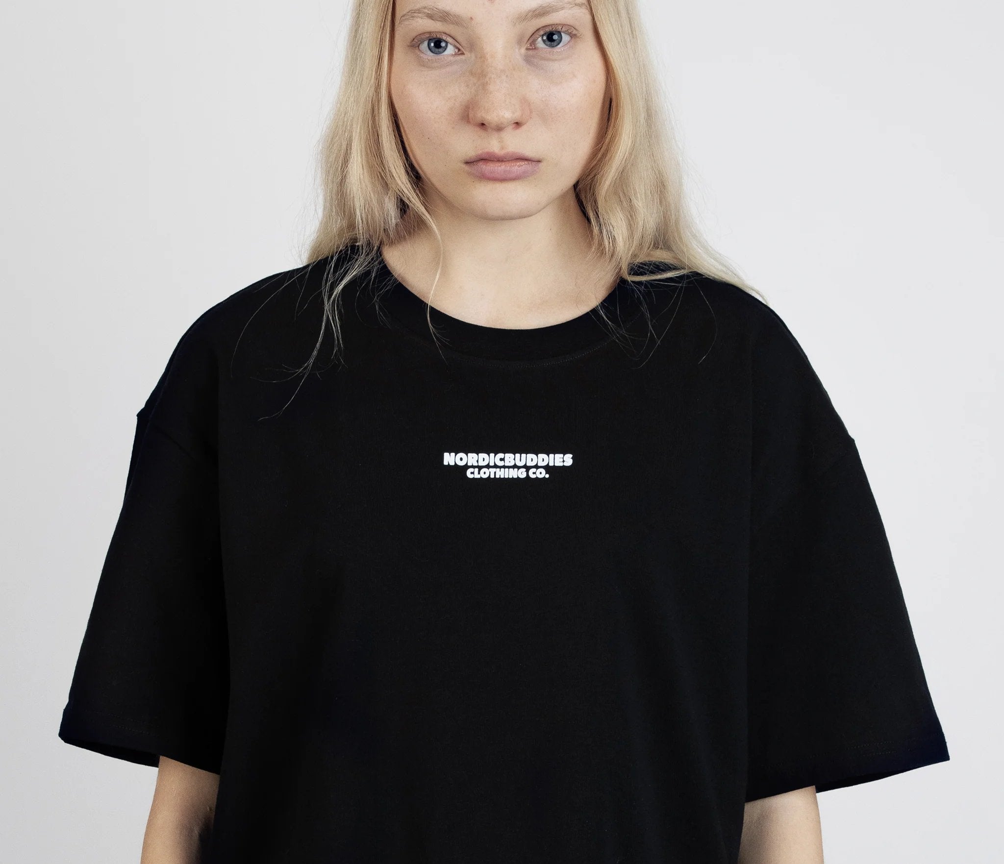9. Close-up of women's Snufkin Fishing T-Shirt by Moomin, front logo detail