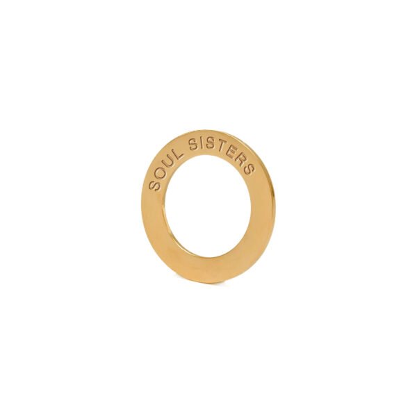 9. Lifestyle image of red silk ribbon bracelet with 'SOUL SISTERS' ring, Olla packaging on wooden tray