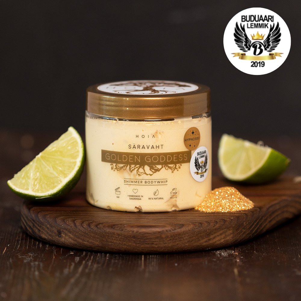 4. HOIA homespa Shimmer Bodywhip Golden Goddess jar with lime slices and shimmering particles, studio setting