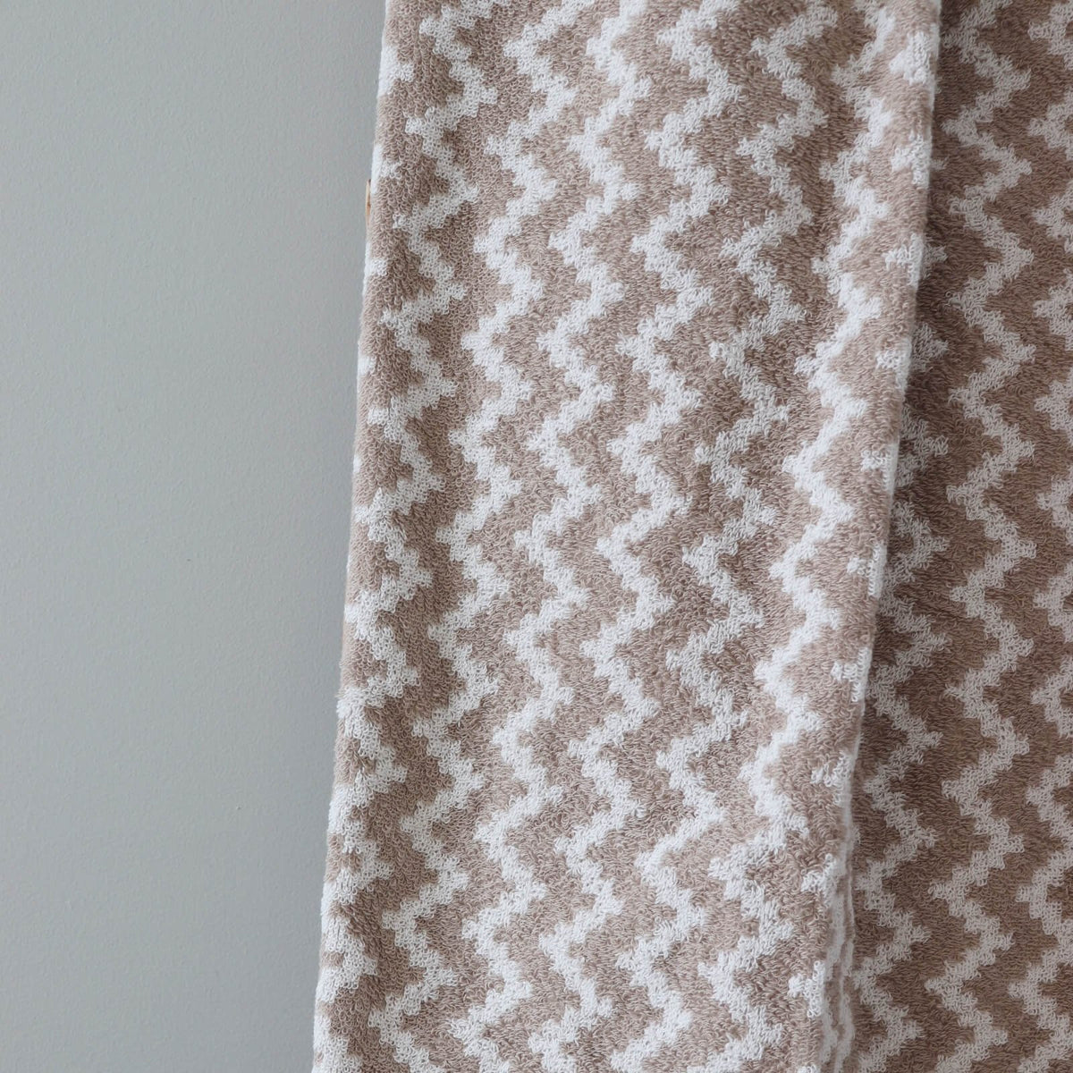 3. Close-up of beige and white terry fabric showing Tartu County mitten pattern texture