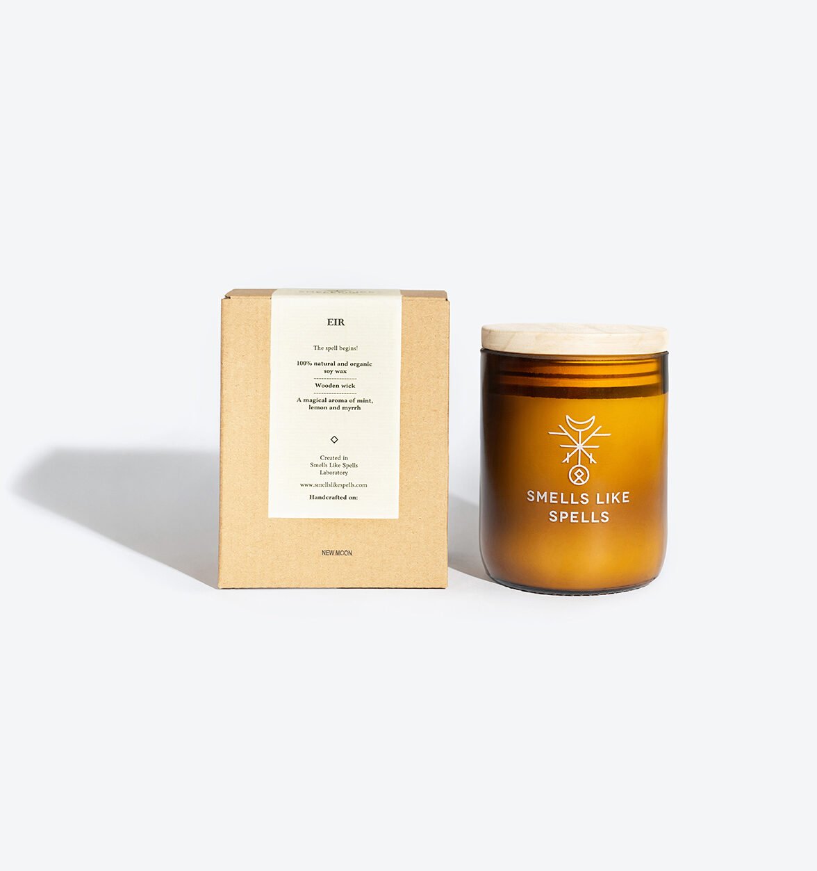 3. Smells Like Spells Scented Candle EIR with packaging, highlighting product details and amber glass jar
