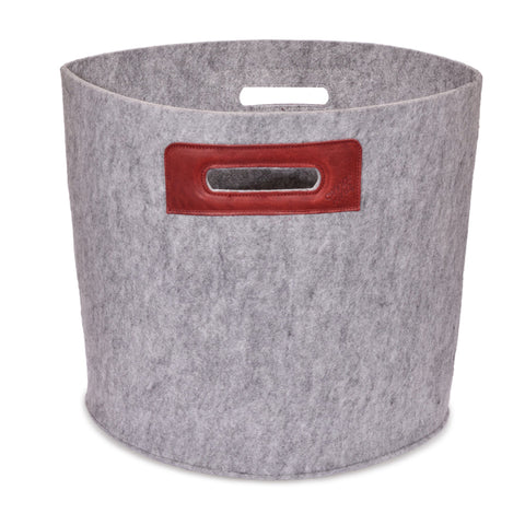 2. Studio shot of grey Felt Omaking Basket with bordeaux leather handle details, highlighting sturdy felt construction