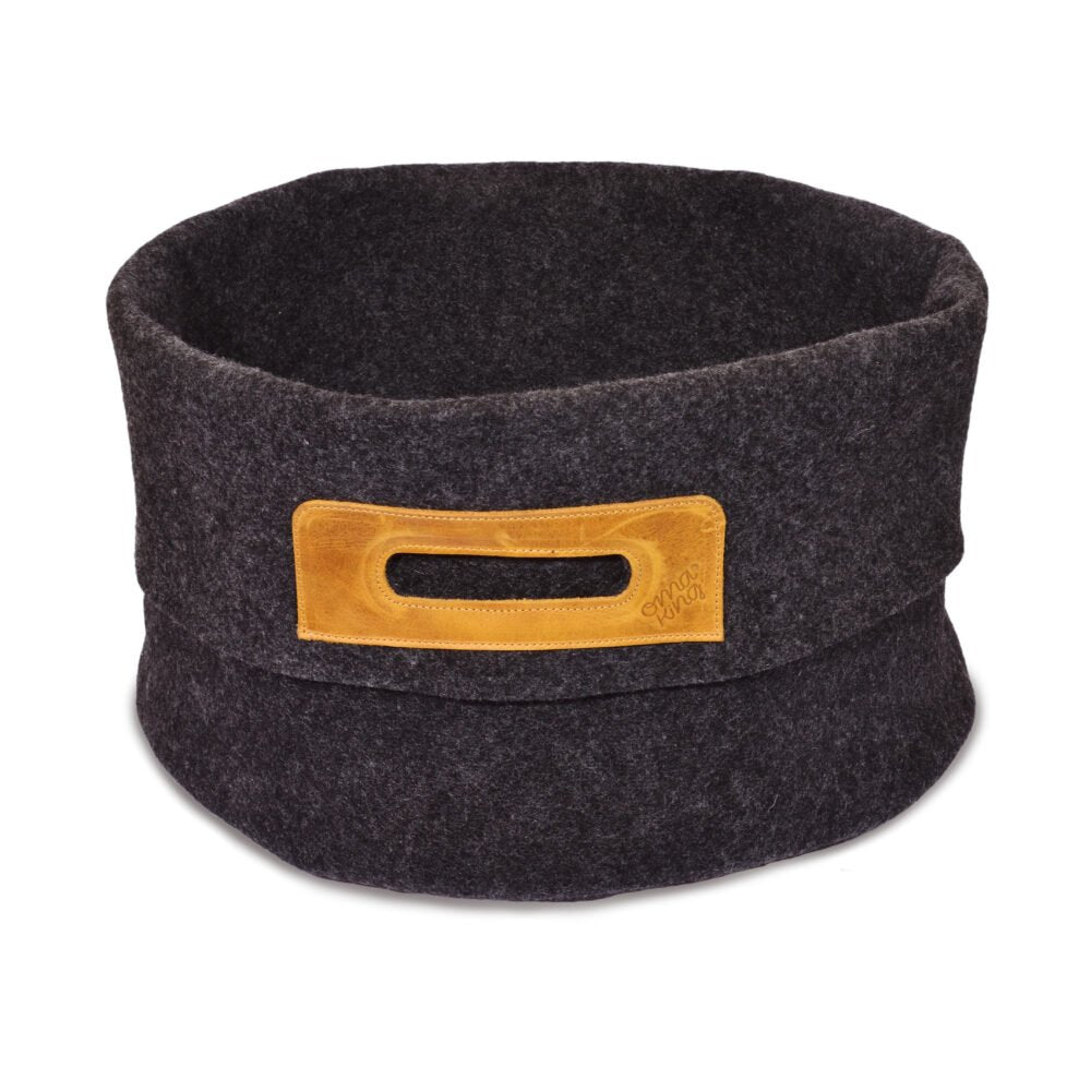 2. Studio image of Wool Felt Omaking Basket in dark grey with cognac leather handle, showcasing its sturdy design and generous capacity