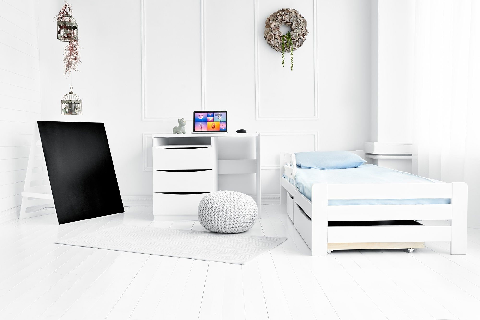 7. White children's bedroom set with bed, desk, and blackboard in bright room