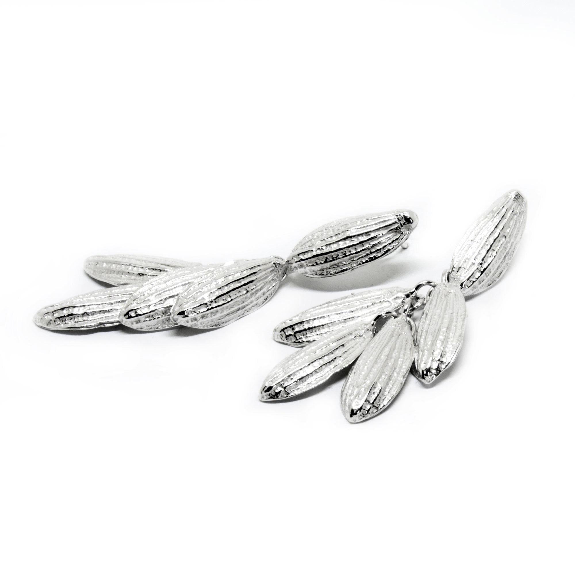 1. Close-up of Agnes Veski Jewellery Spring 2 earrings in 925 silver, inspired by nature, shown in a studio setting