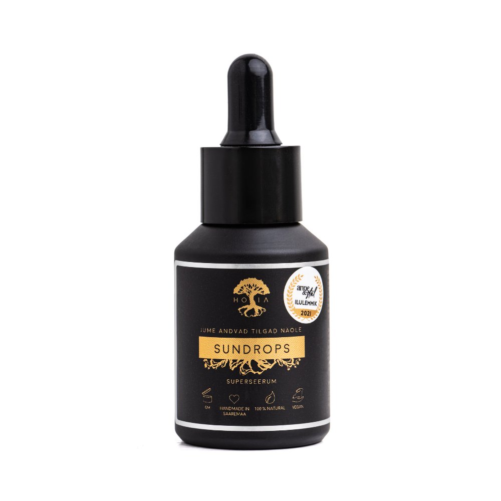 3. Studio shot of HOIA homespa Superserum Sundrops bottle with black and gold label