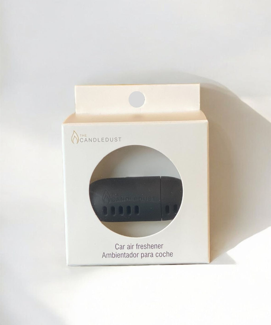 6. Candledust Signature car air freshener in packaging, showing product branding