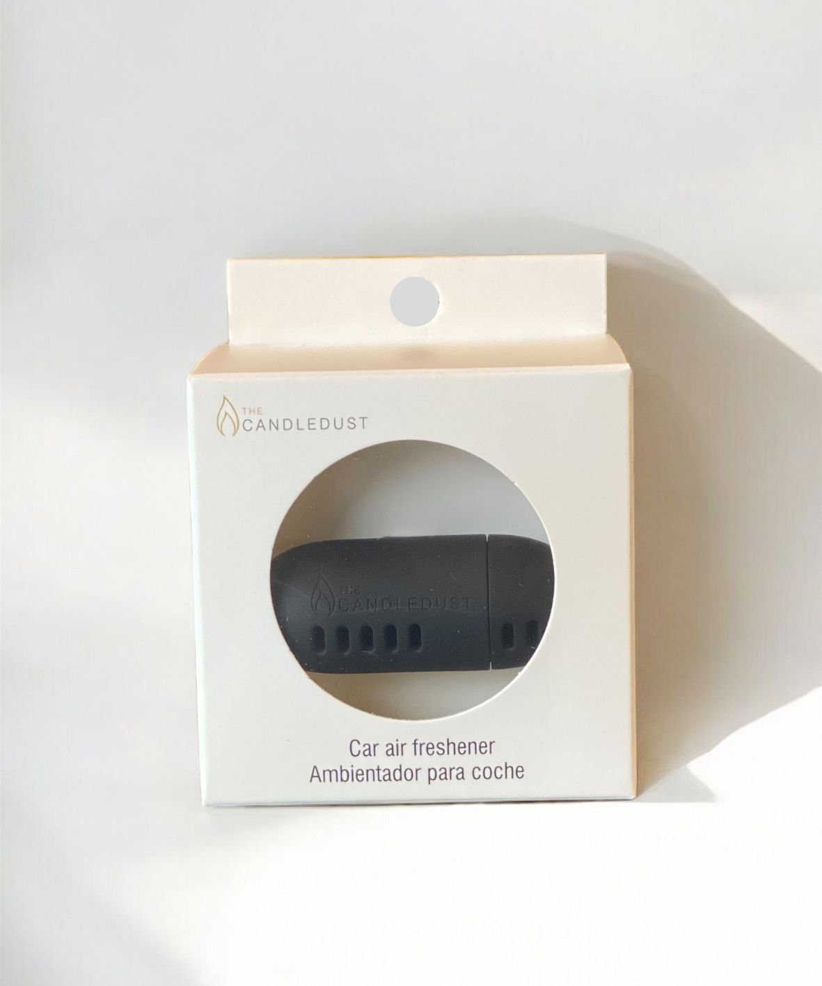 6. Candledust Signature car air freshener in packaging, showing product branding