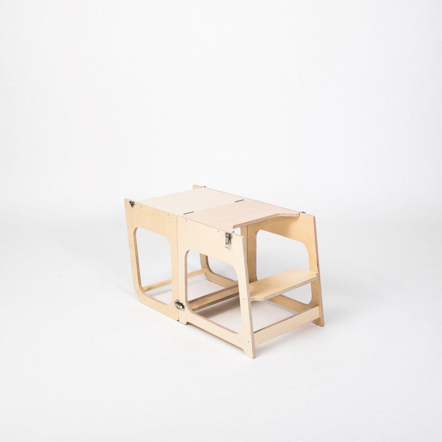 10. Natural wood transformable kitchen tower in table configuration on white background