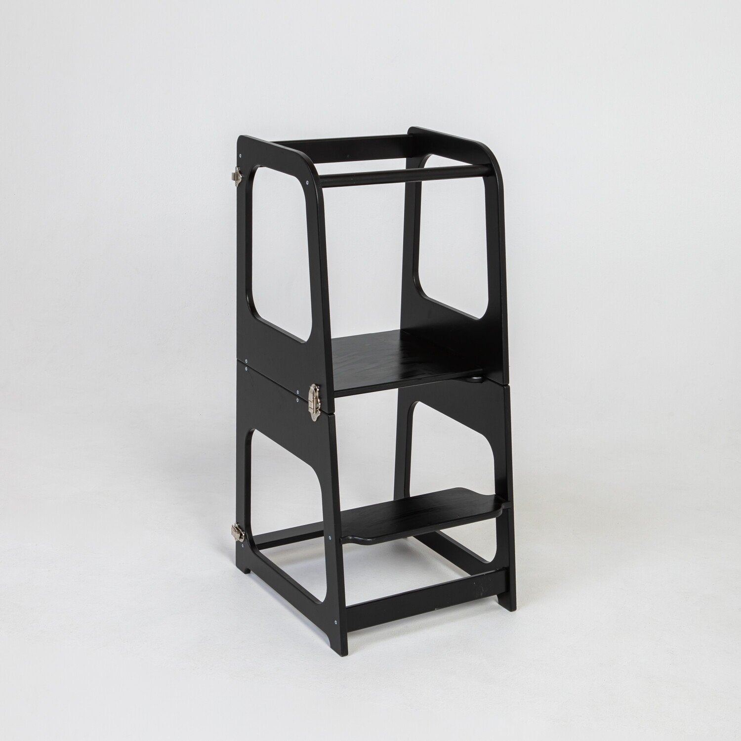 14. Black transformable kitchen tower in step stool configuration on white background