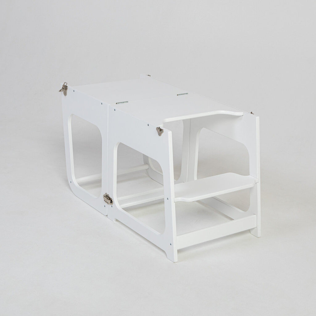 12. White transformable kitchen tower in table configuration on white background