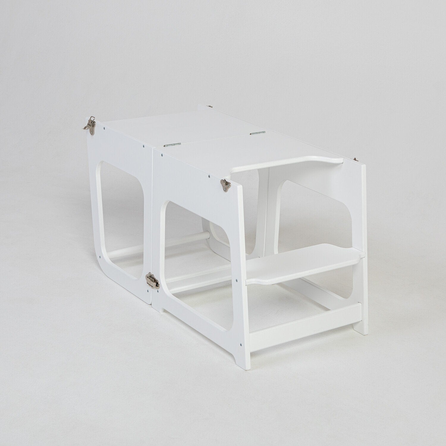 12. White transformable kitchen tower in table configuration on white background