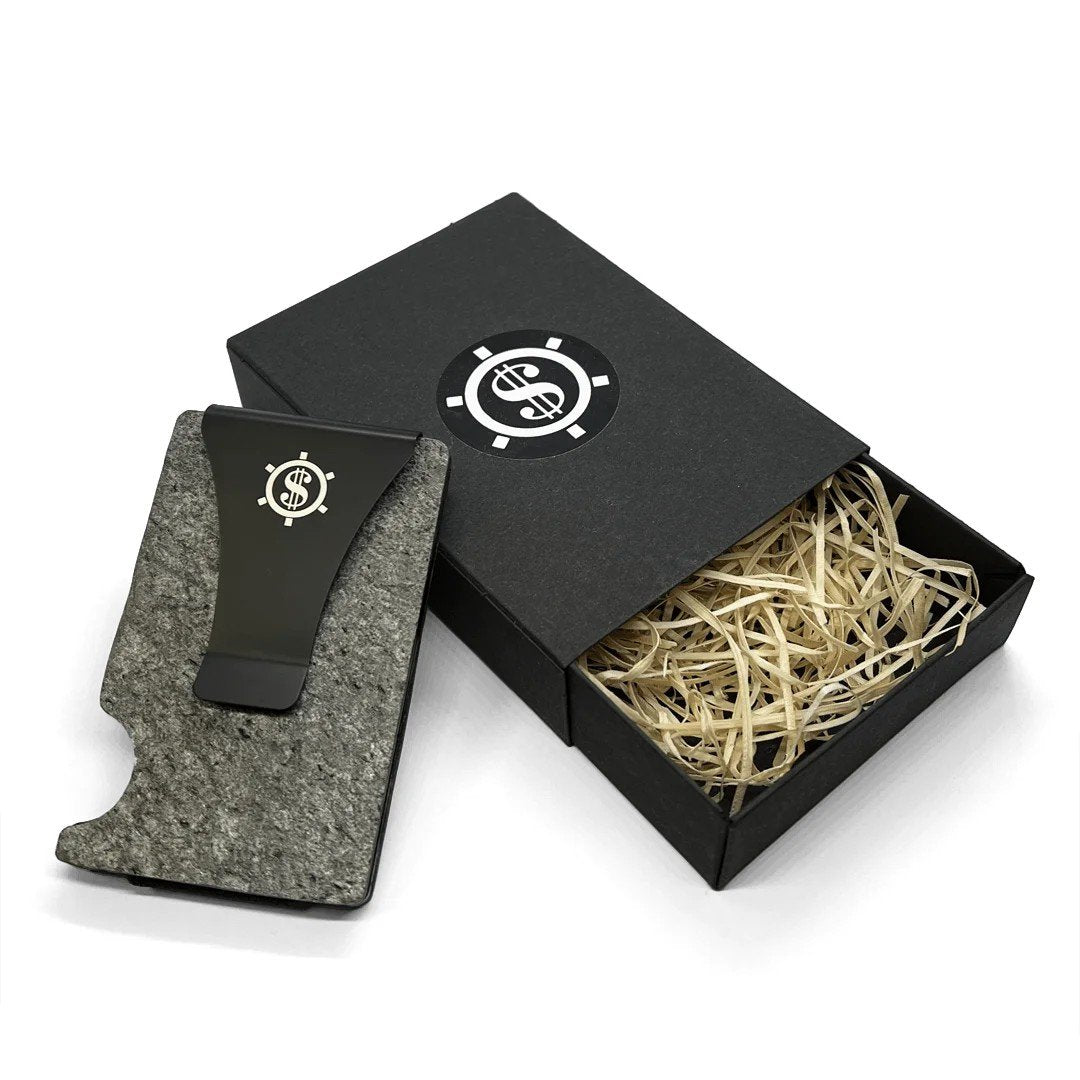 4. Tume Kask cardholder with money clip in black packaging with eco-friendly straw filling