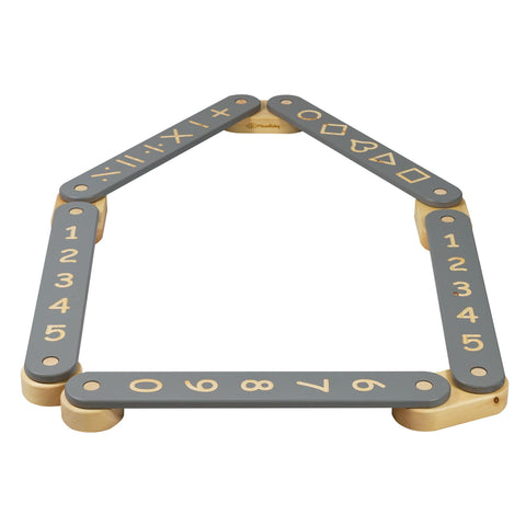 1. Wooden balance beam with black surface featuring numbers and geometric shapes, arranged in a pentagon shape