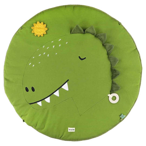 3. Close-up of green dinosaur face on play mat with textured sun and wooden ring, highlighting playful design