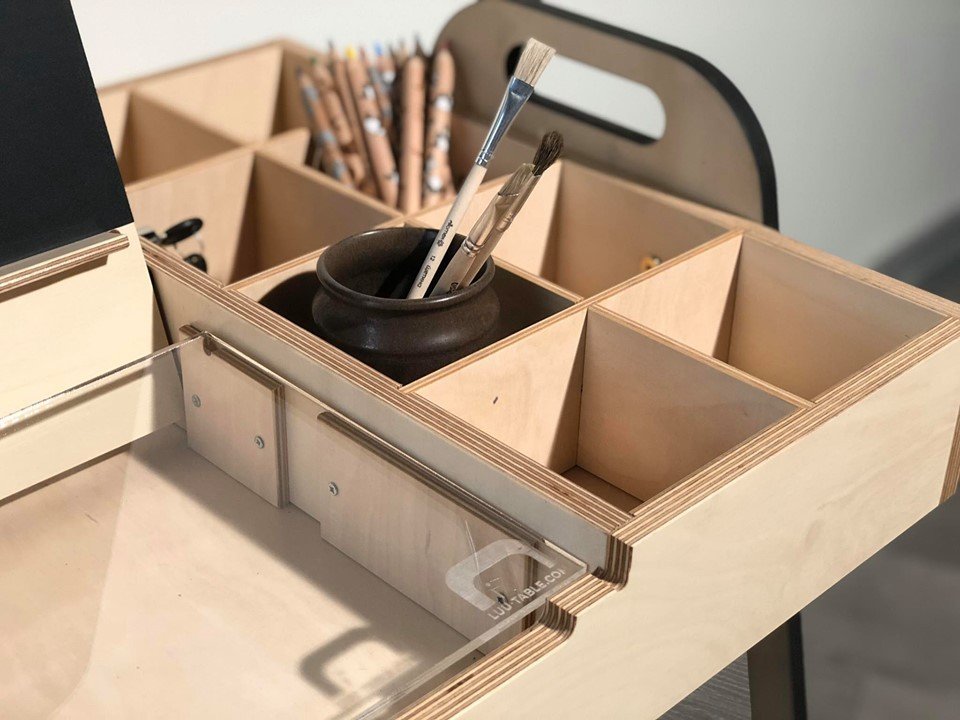 13. Children's workspace with Luula Julle table and chair in mint green, featuring educational tools