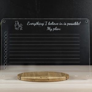 6. Close-up of Luula Julle table with educational materials and chalkboard, promoting creative play