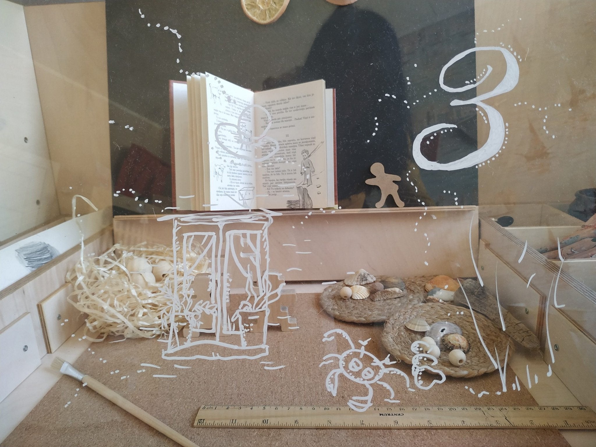 3. Close-up of Montessori table with various educational items