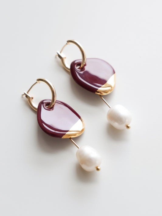 7. Rozenthal Arp Pearl and Porcelain Earrings in burgundy with gold-plated hoops and freshwater pearls