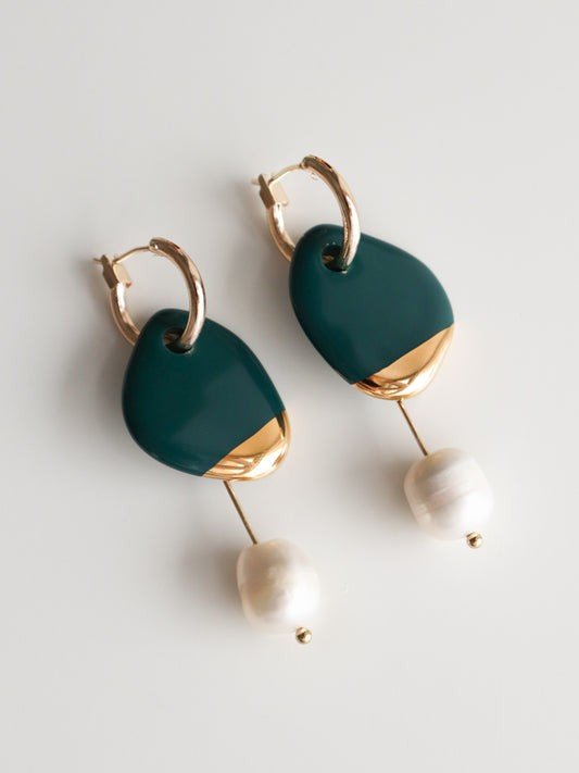 6. Rozenthal Arp Pearl And Porcelain Earrings in green with gold-plated hoops and pearls, studio shot