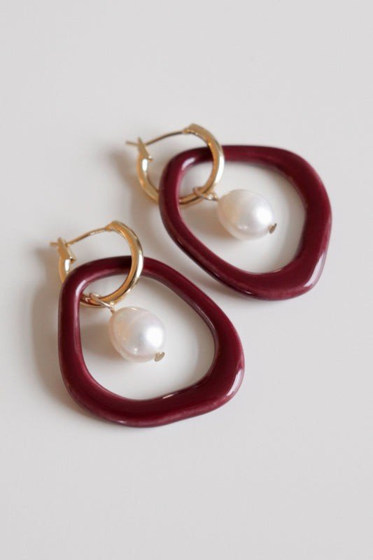 2. Rozenthal Arp Pearl and Porcelain Hoops in burgundy with freshwater pearls and gold-plated hoops, studio shot