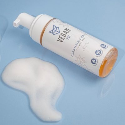 2. Vegan Fox Cleansing Foam bottle with foam on blue background, 200 ml, for oily skin