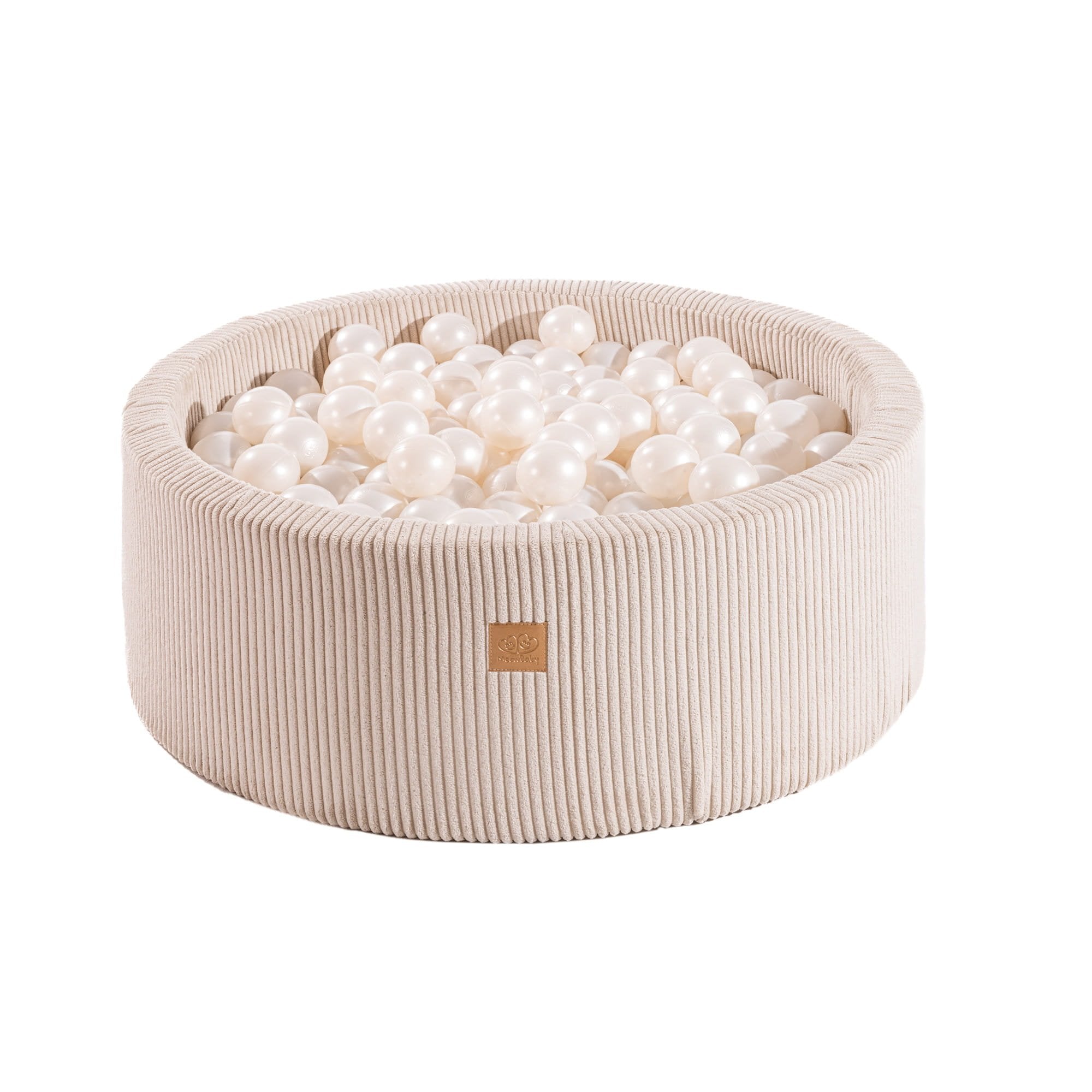 1. Round velvet ecru ball pit filled with 200 pearl balls, featuring soft hypoallergenic foam and zippered cover, ideal for children's sensory play and motor skill development.
