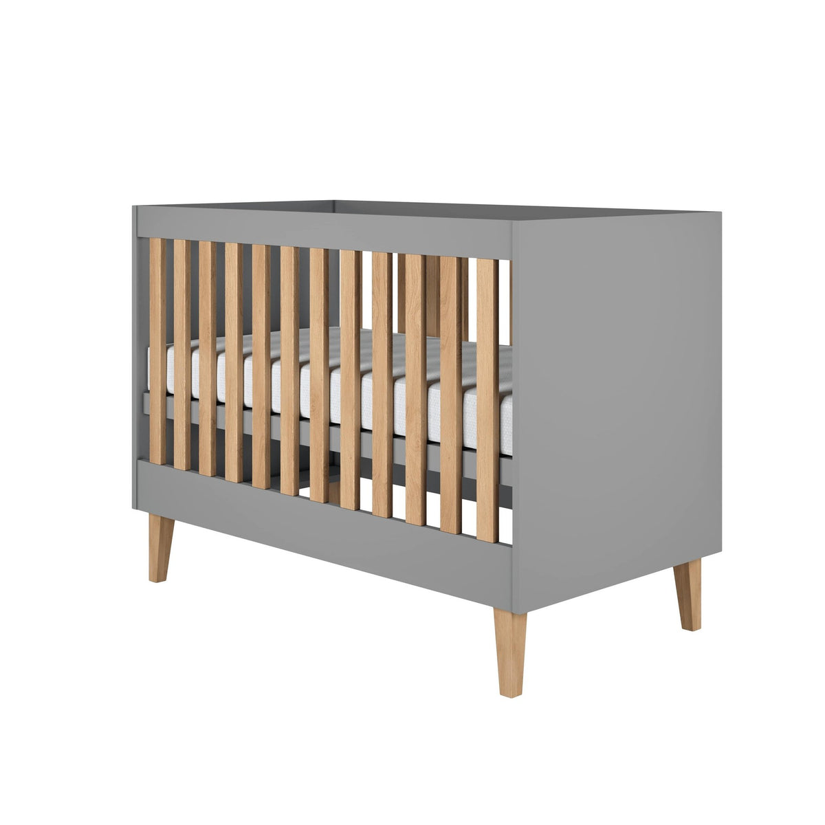 2. Grey baby cot with oak slats and legs shown in studio setting, highlighting Scandinavian design