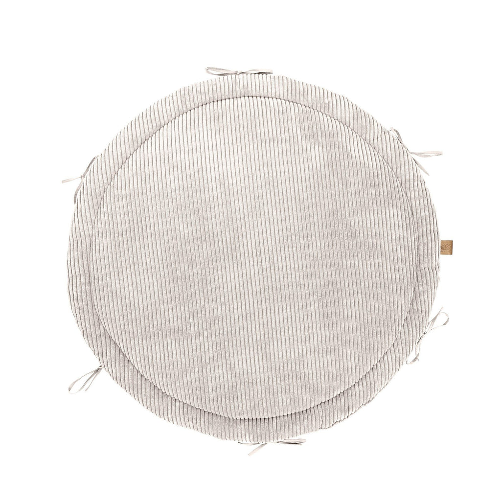 2. Vanilla ribbed corduroy play mat with ties, shown from above