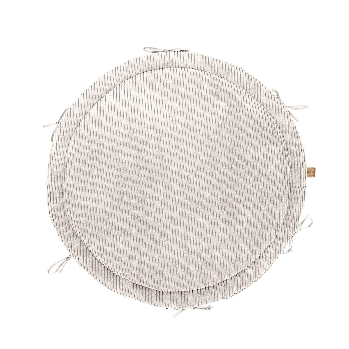 2. Vanilla ribbed corduroy play mat with ties, shown from above