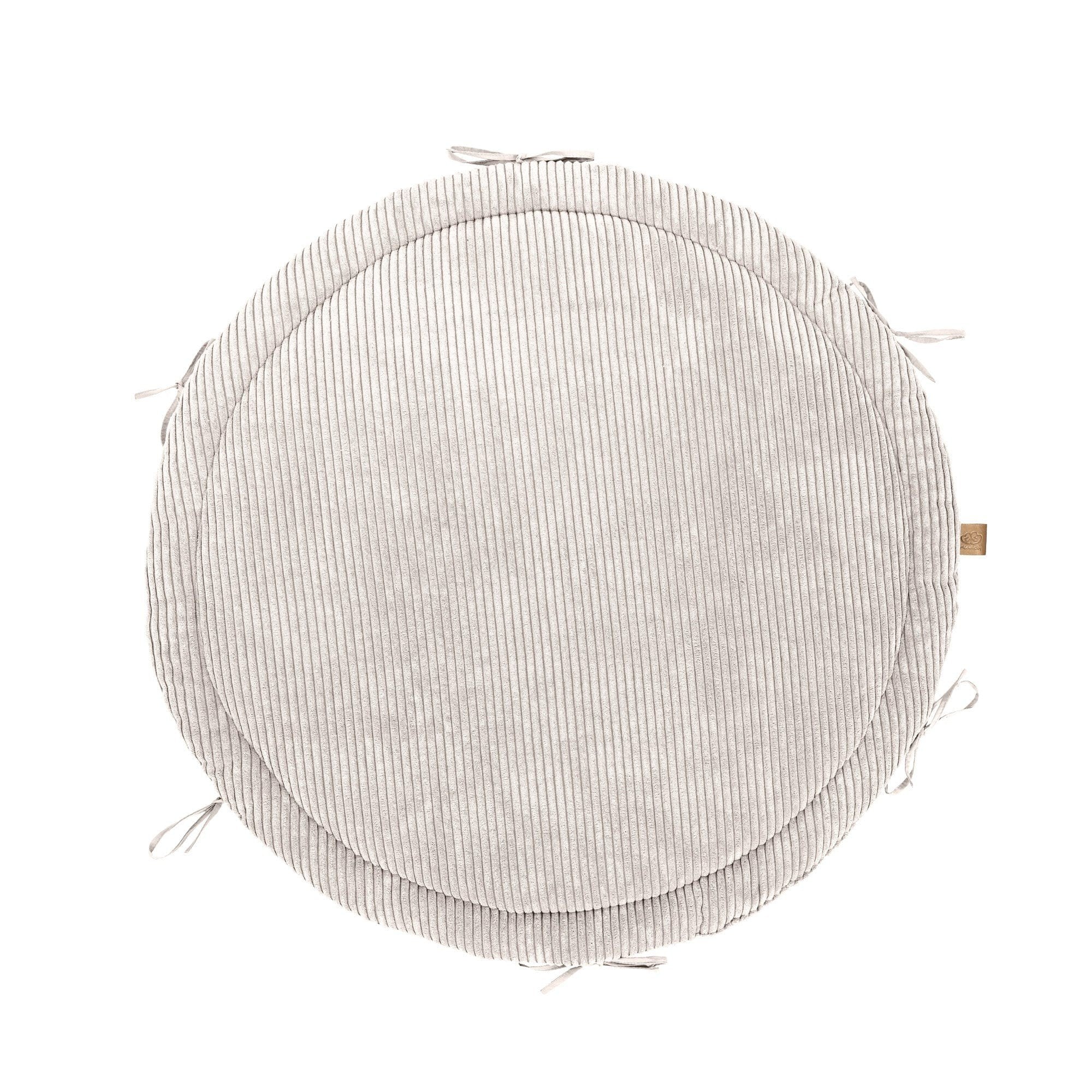 2. Vanilla ribbed corduroy play mat with ties, shown from above